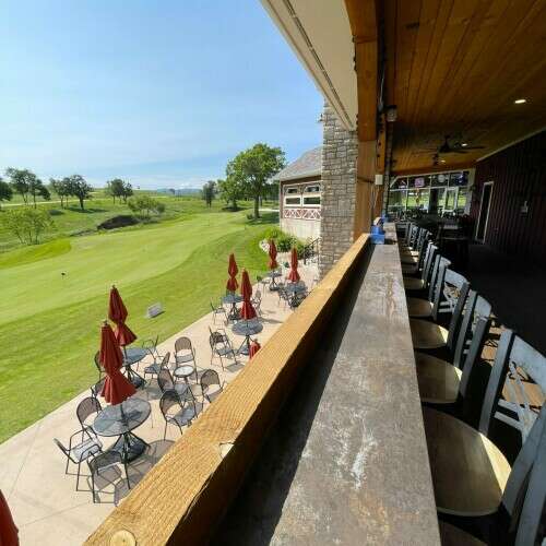 Bar seating looking onto the putting green